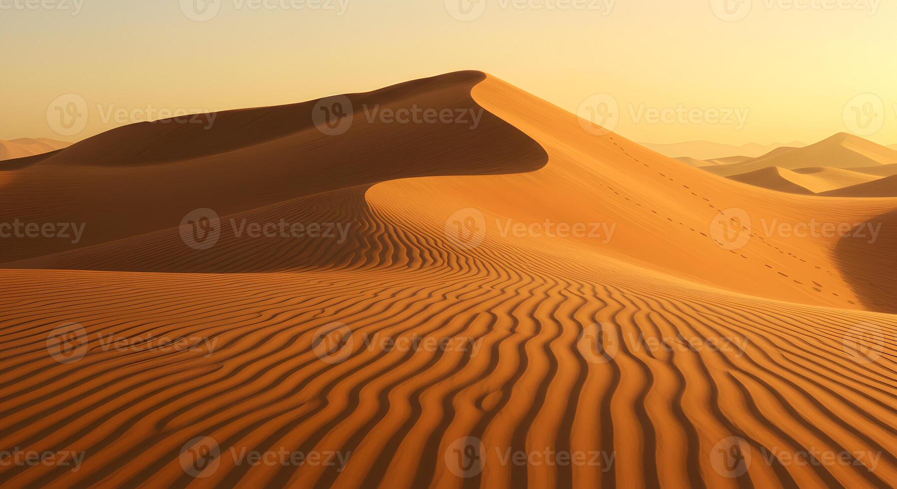 Serene desert landscape featuring golden sand dunes and subtle ridges under the soft glow of warm sunlight photo
