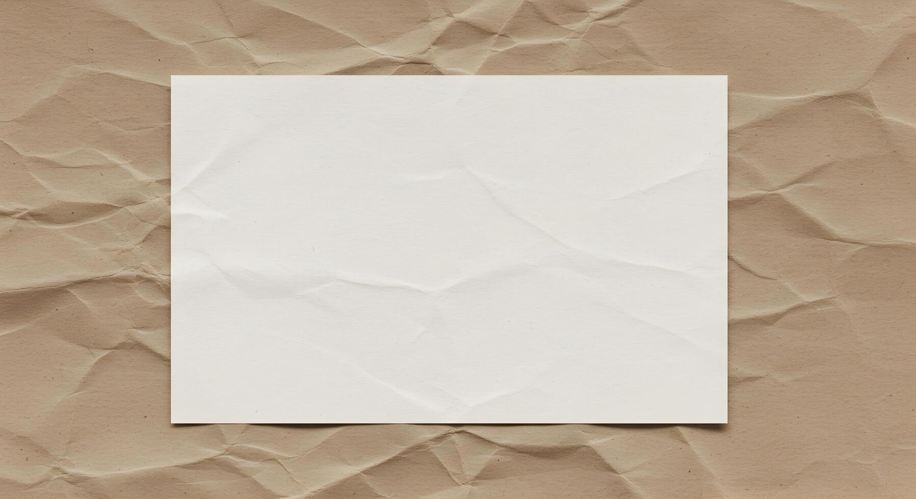 Elegant White Paper Mockup on Rustic Crumpled Brown Paper Background photo