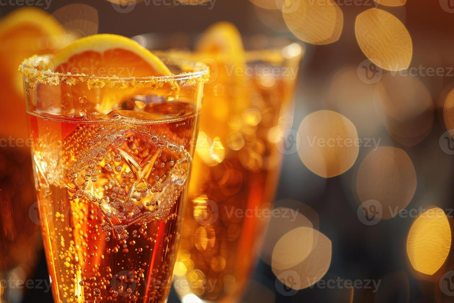 Sparkling Orange Cocktail with Ice Cubes photo