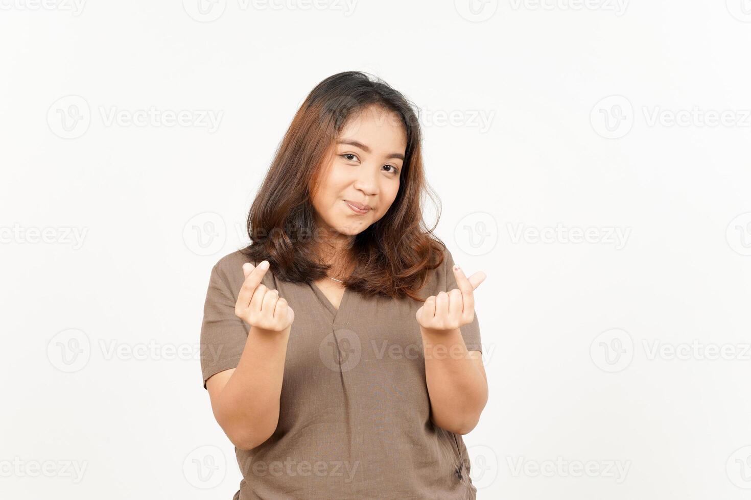 A woman is making a gesture with her hands photo