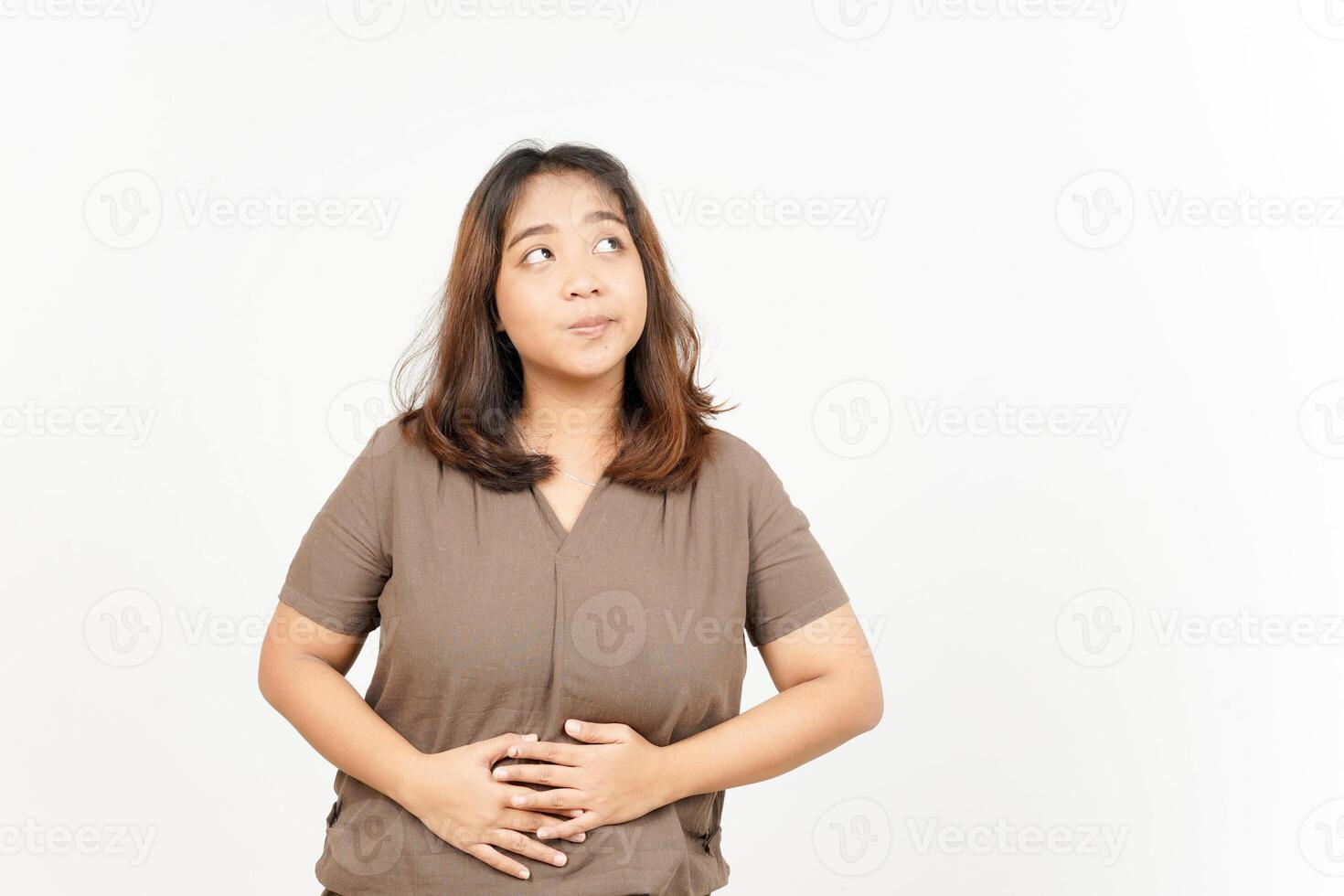 Asian woman with stomach pain isolated on white background photo