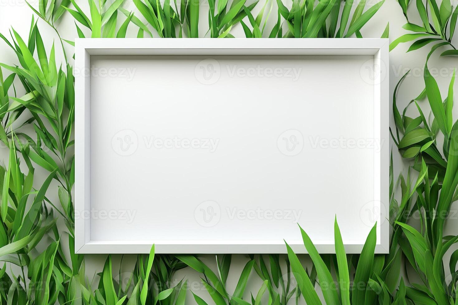 A blank white frame surrounded by lush green leaves, ideal for showcasing art or information. photo