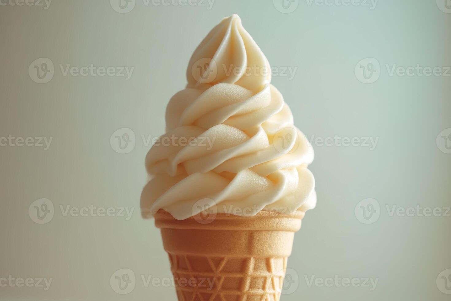 A creamy swirl of soft-serve ice cream in a waffle cone, inviting and delicious. photo