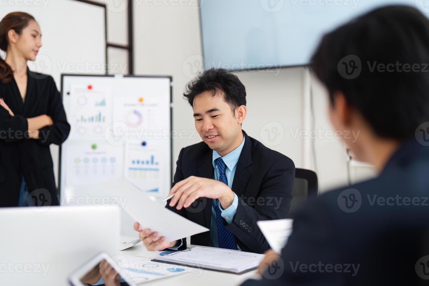 Effective Leadership and Team Collaboration. A manager guiding team discussions in a strategic meeting. photo