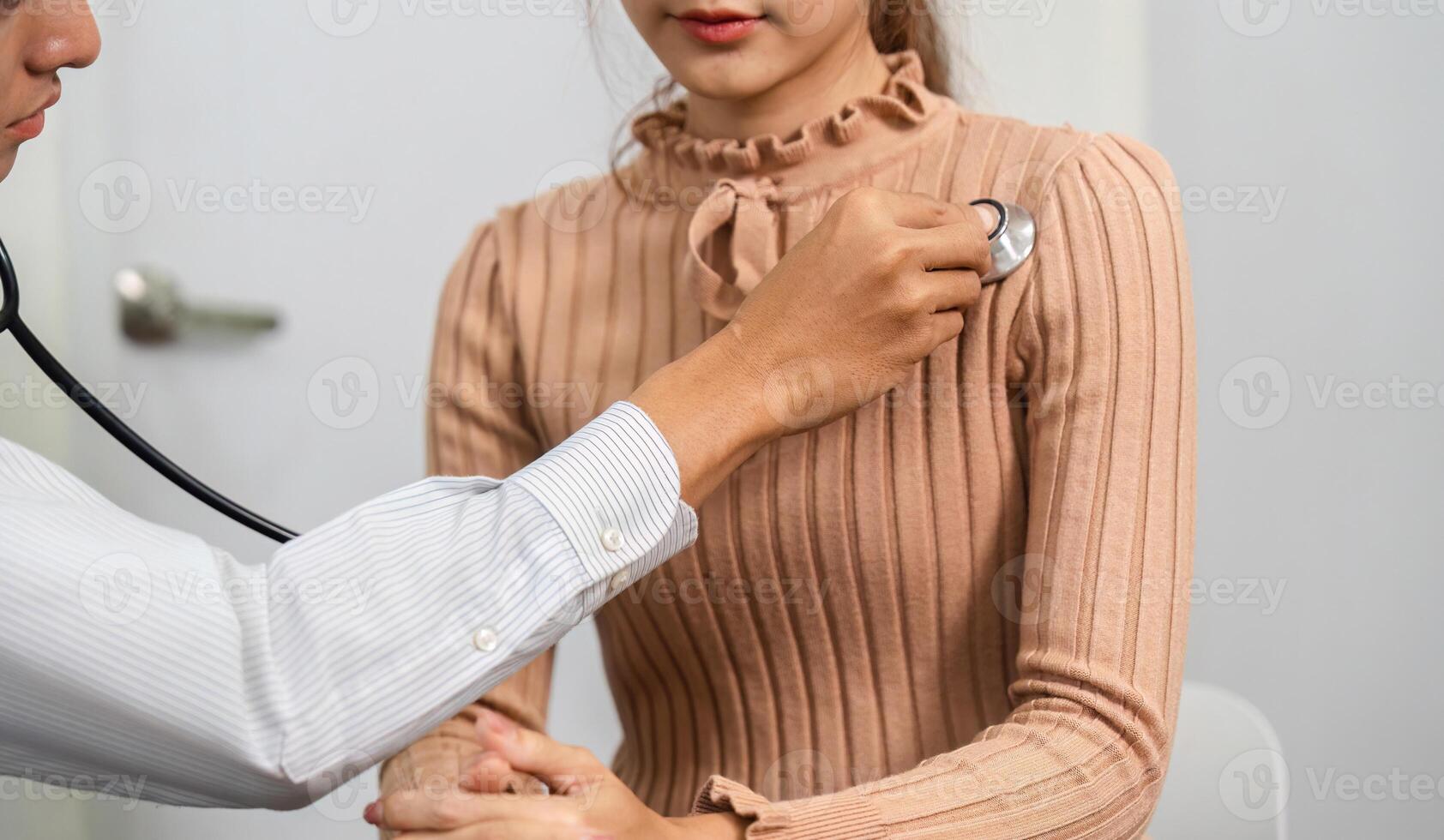 Health Checkup and Patient Interaction. A healthcare professional conducting a routine examination with a patient. photo