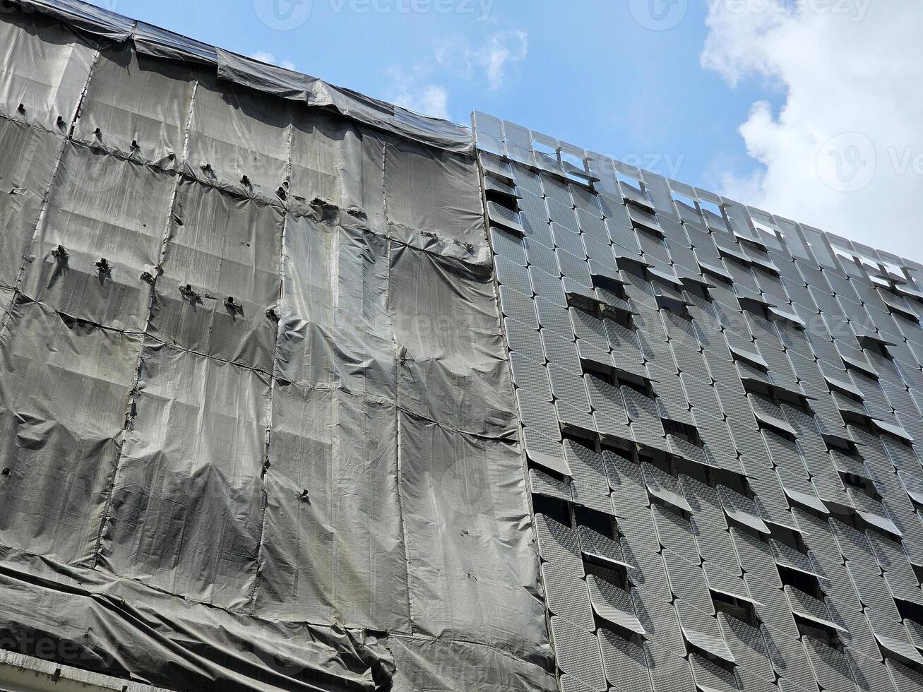 Dust Cover Net of Under Modern Construction Building. photo