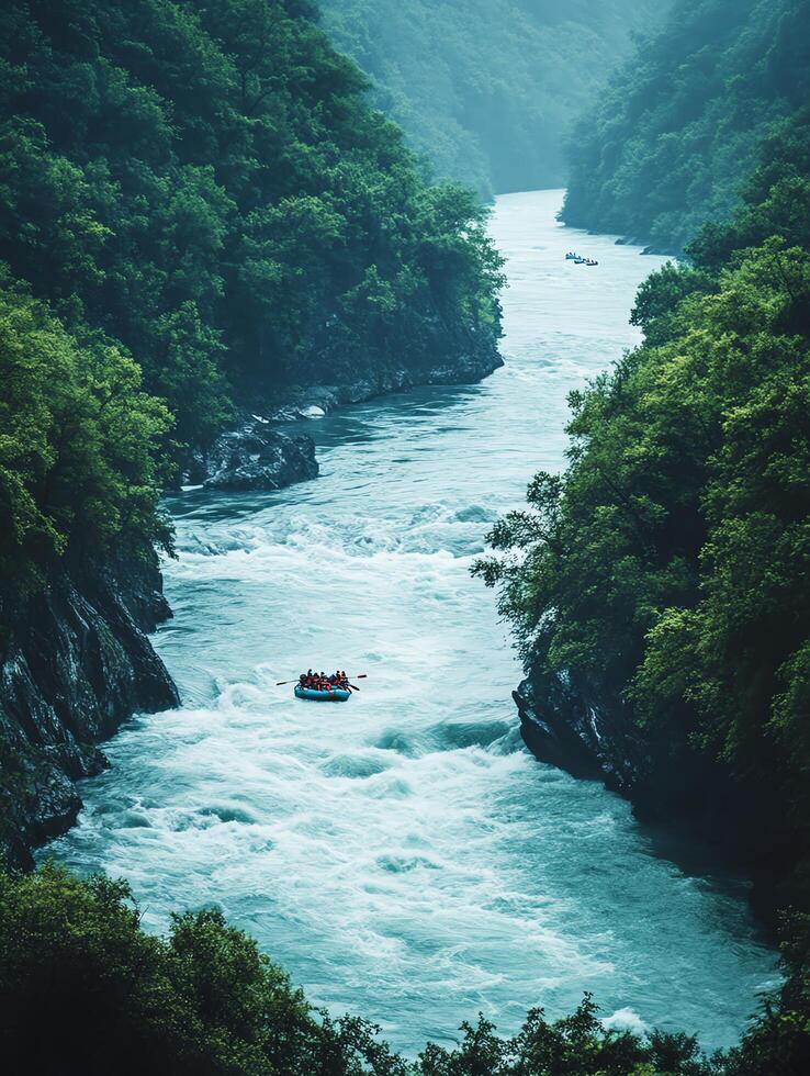 Aerial View of Whitewater Rafting Adventure on Turquoise River Through a Lush Green Forest Canyon on a Sunny Day photo