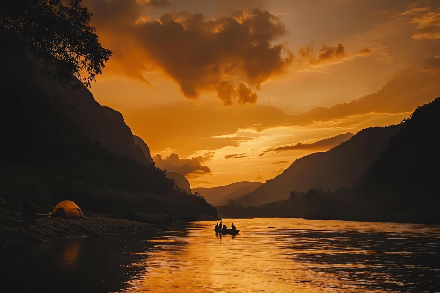 Golden Sunset Reflected On Wavy River with Silhouette Mountain Range and People in Canoe Under Cloudy Orange Sky photo