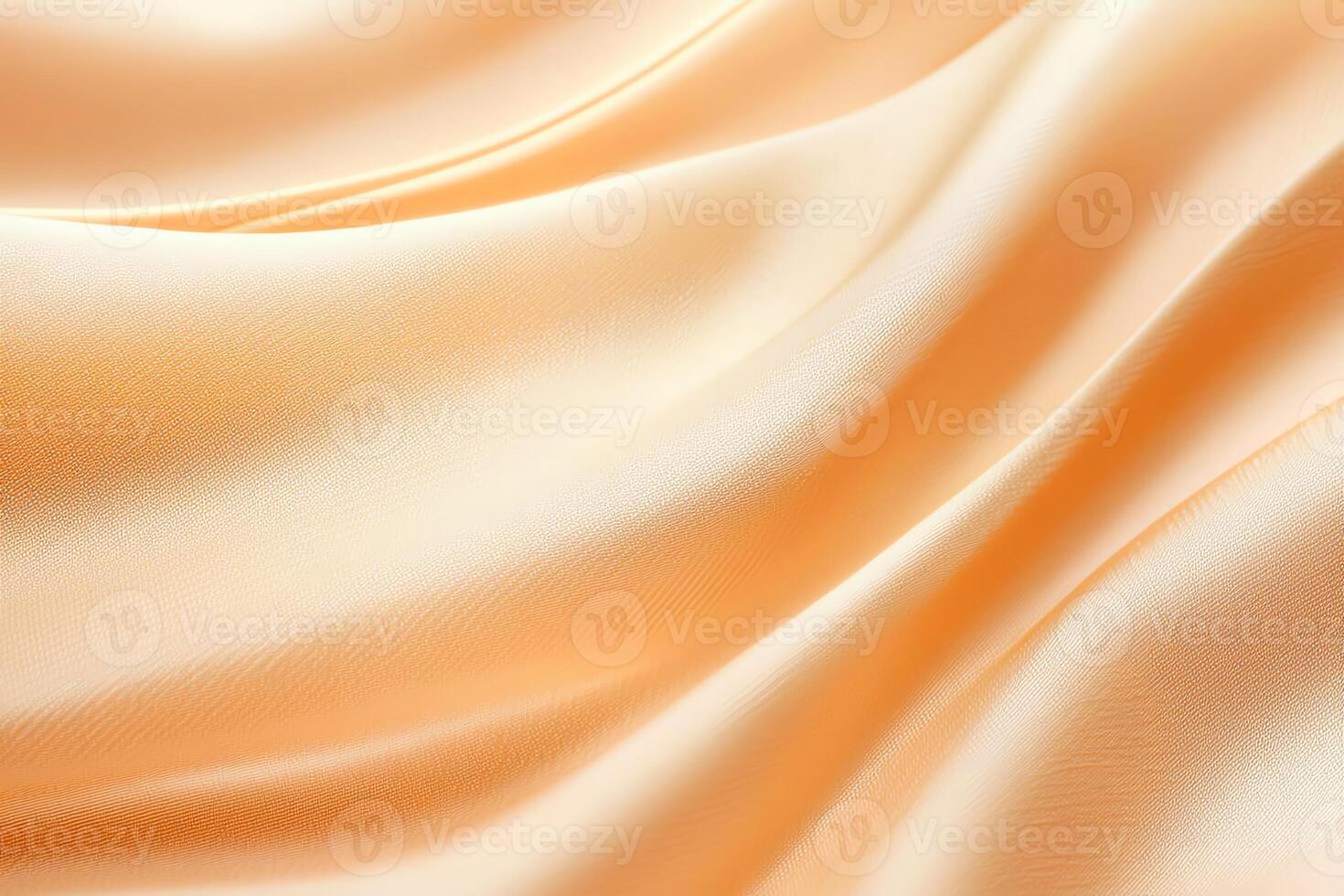 A close-up view of smooth, flowing satin fabric in a delicate peach color, showcasing its luxurious texture and sheen, perfect for fashion, interior design, and creative projects. photo