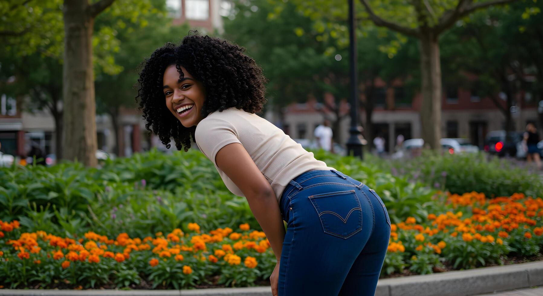 Stylish woman in trendy jeans, bending slightly while looking back with a friendly expression, ideal for digital marketing. photo