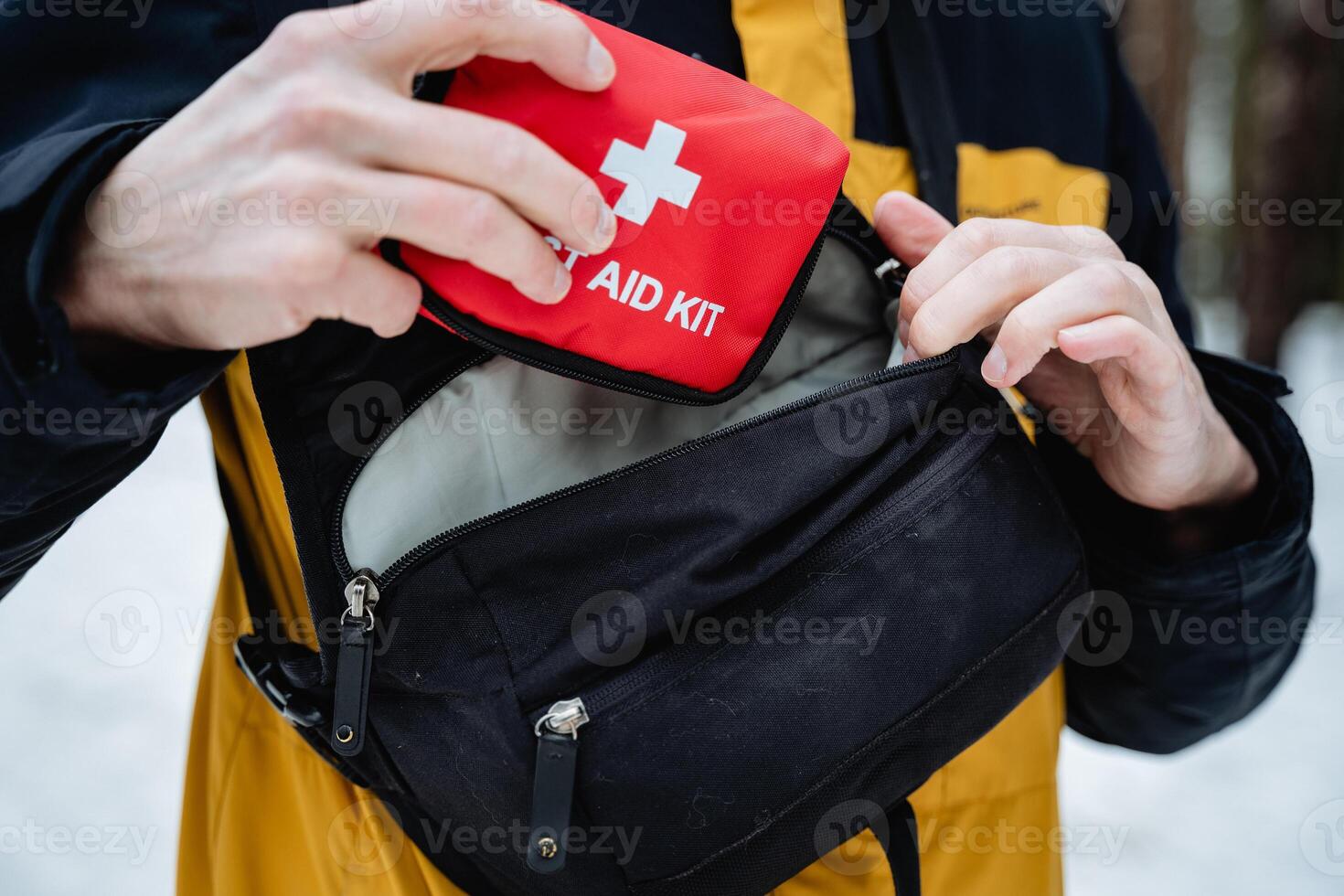 A determined individual has a wellequipped first aid kit, ready to provide immediate assistance for emergencies or injuries, ensuring safety and health in any situation photo