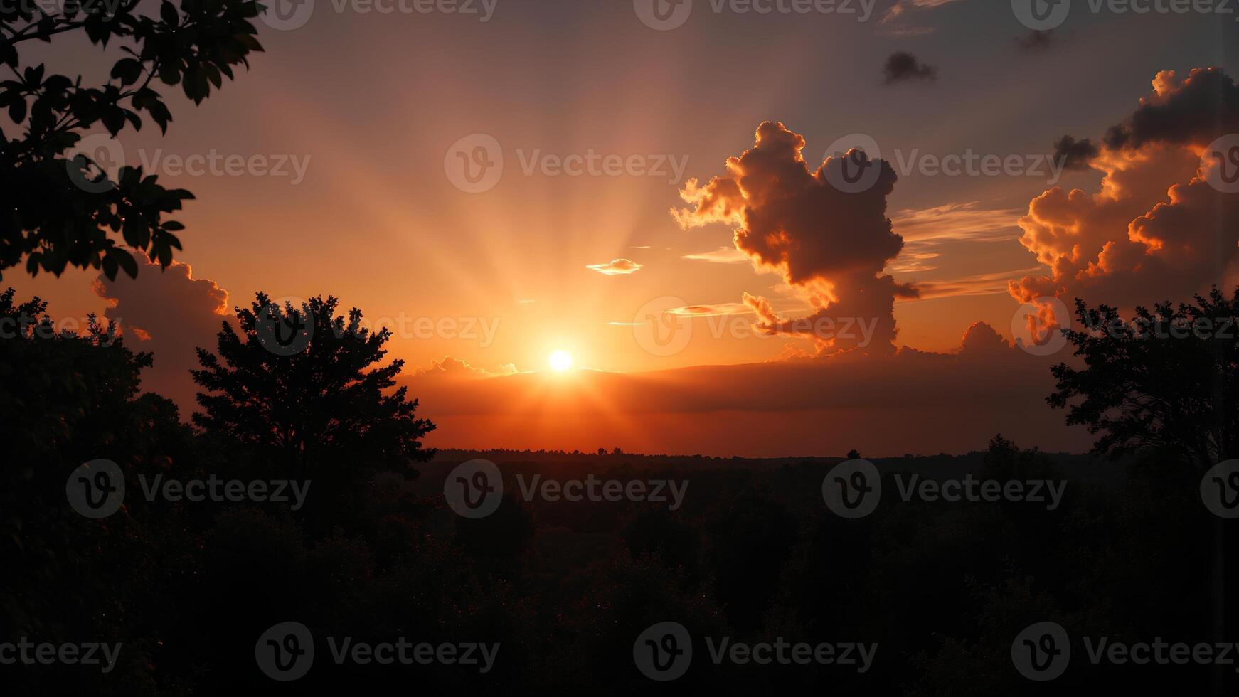 Majestic Sunset with Rays and Clouds over a Serene Landscape photo