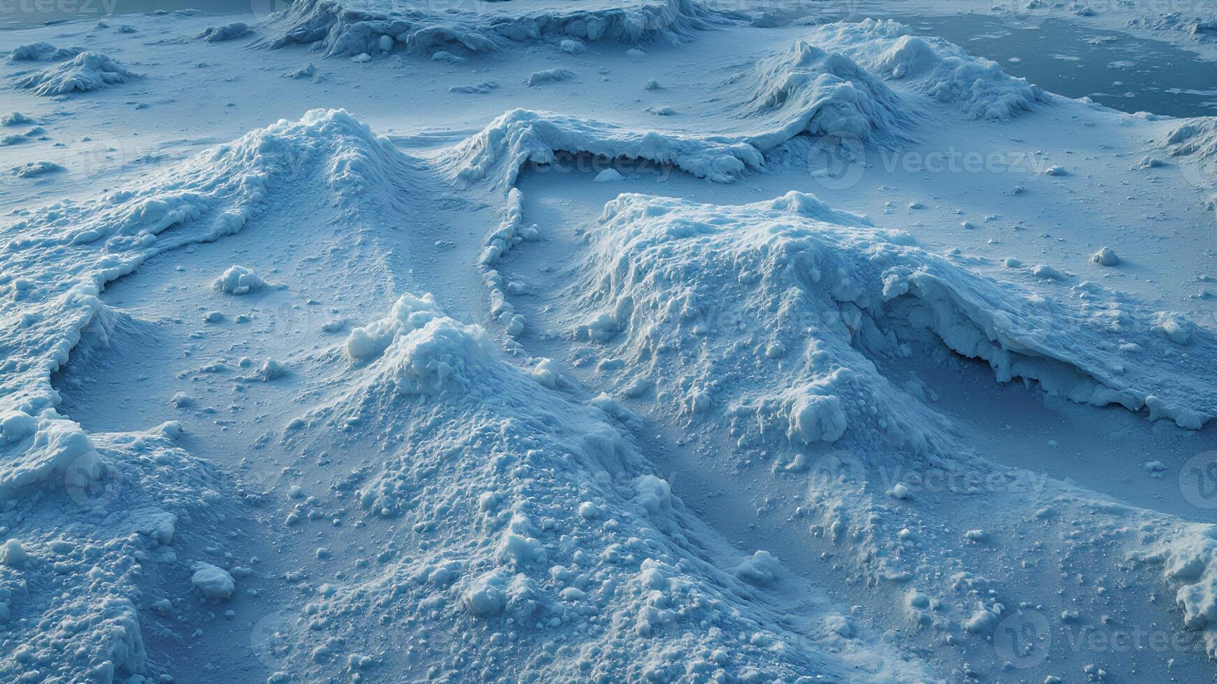 Frosty Snowy Landscape with Textured Ice Formations and Peaks photo
