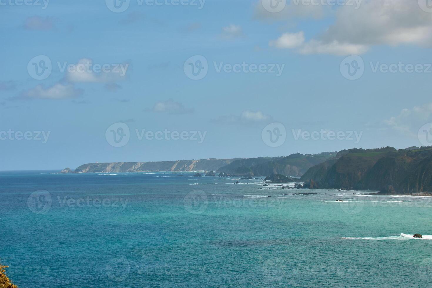 Panoramic sea view from Senda de Cadavedo, Cabo de Busto, Asturias, Spain, with rugged cliffs photo