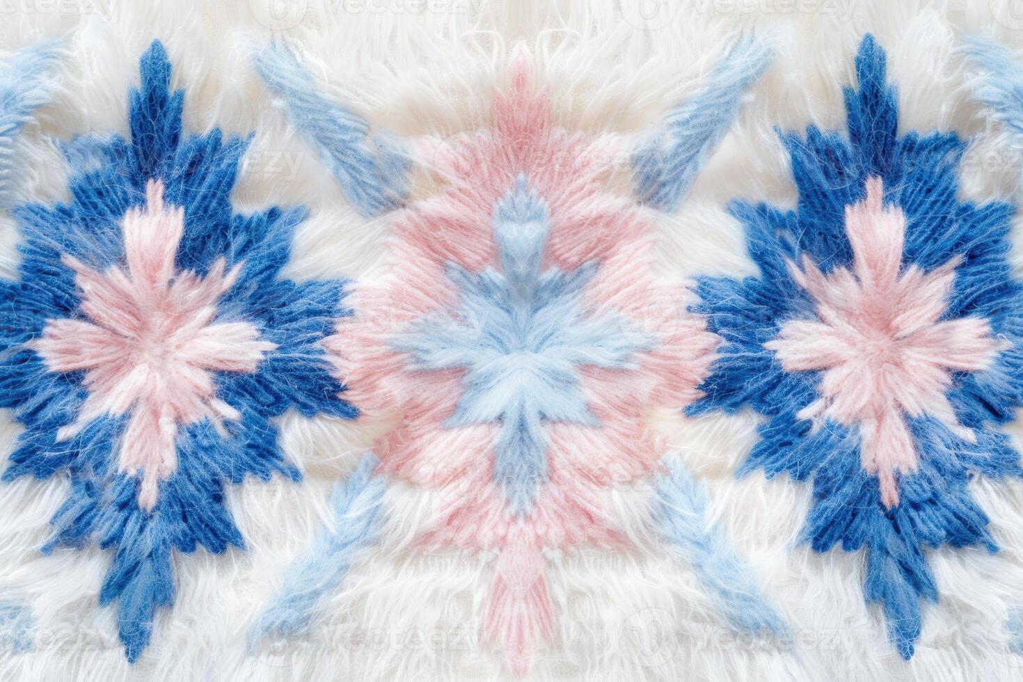 Colorful geometric pattern in blue and pink on soft textured fabric design photo