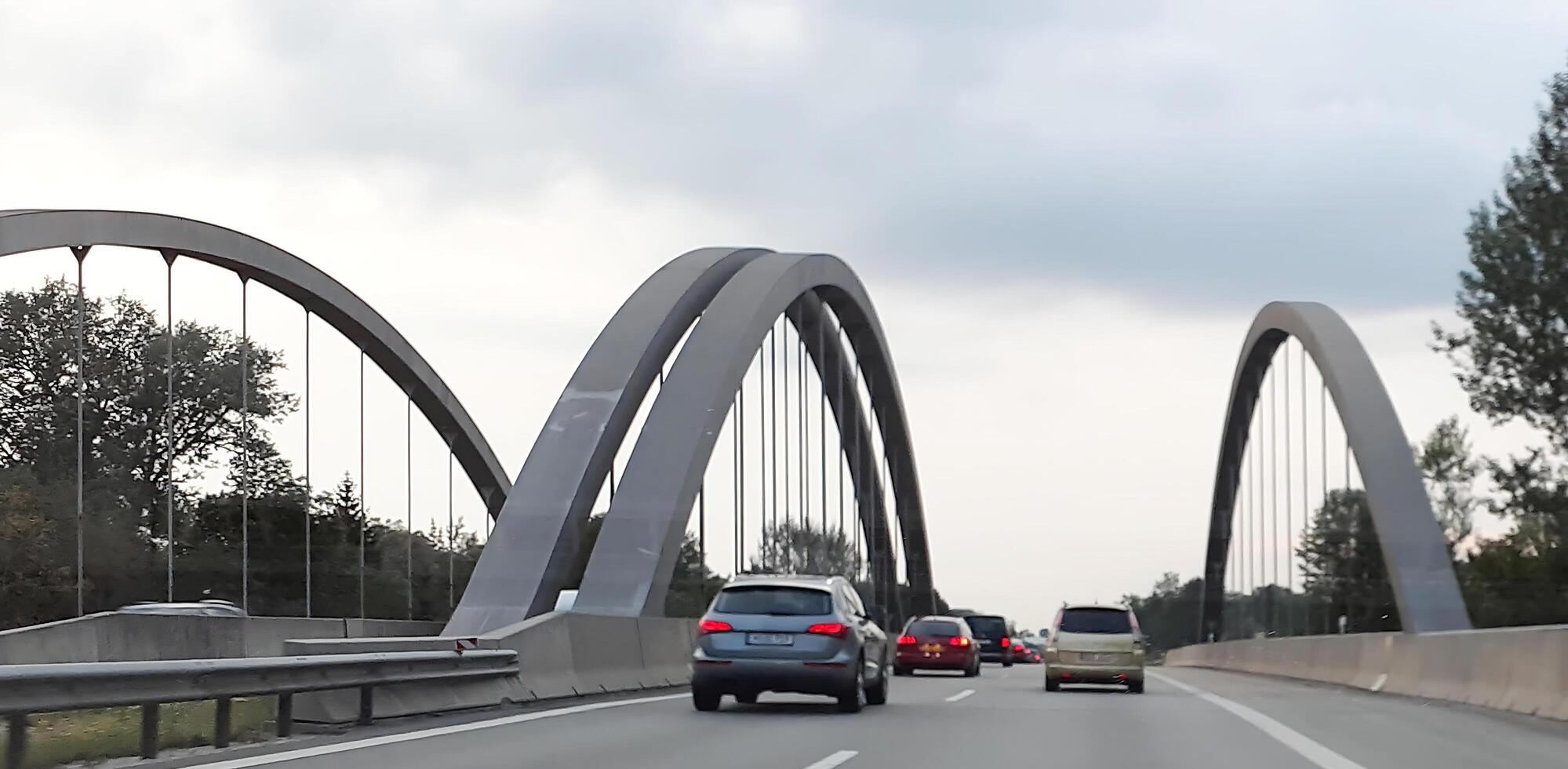 View of a highway passing over a bridge, creating a dynamic line. For concepts of infrastructure photo