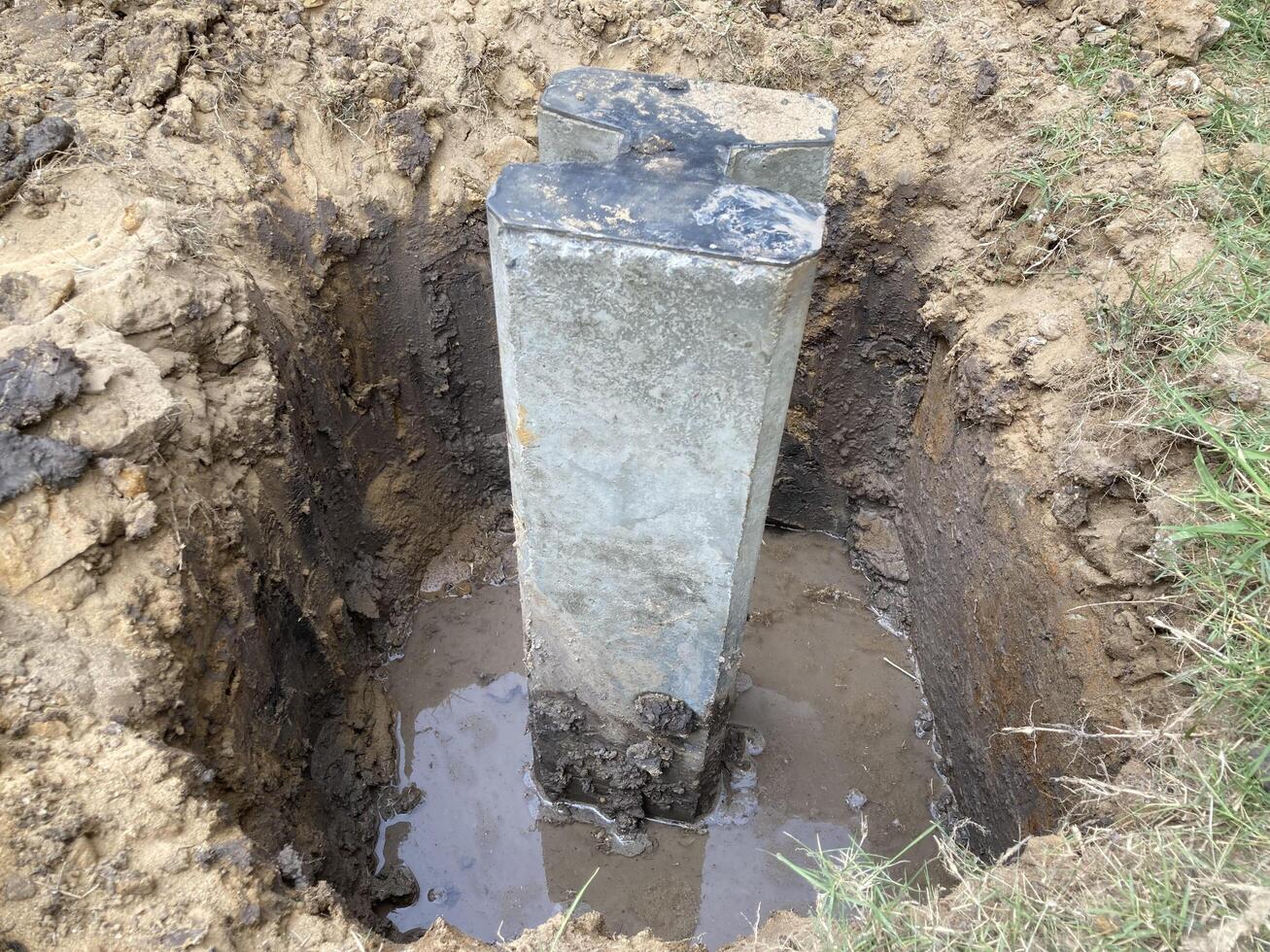 Precast Concrete Digging holes Pile Foundation Installation for building at construction site. photo