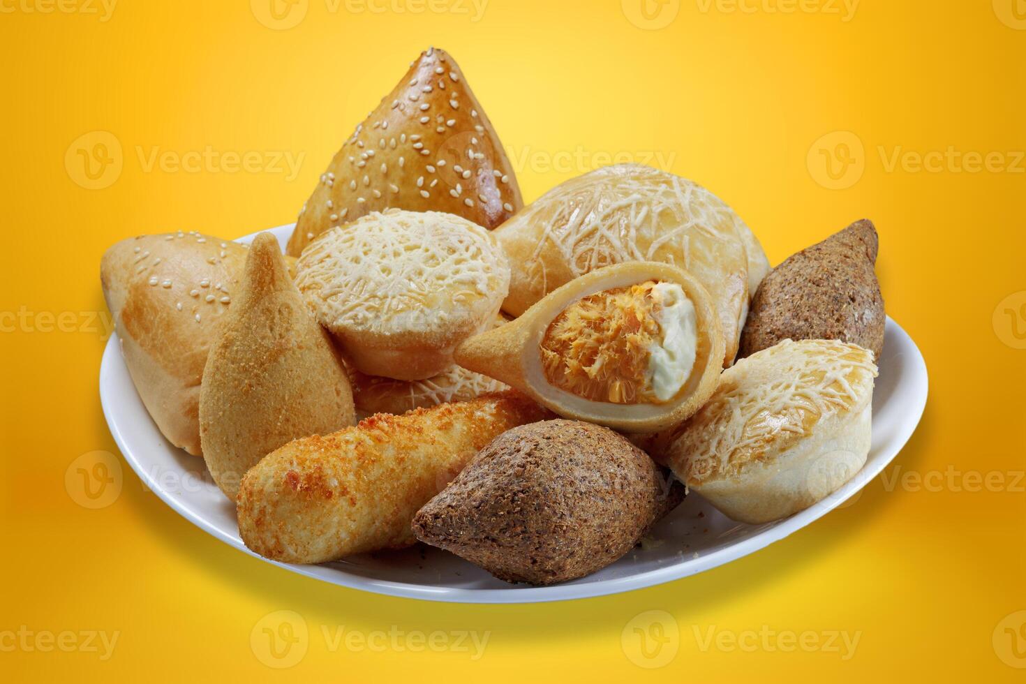 Brazilian snacks,. esfirra, kebab, patty, coxinha, sausage wrapped photo