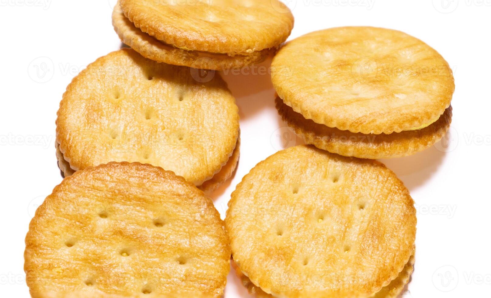 Round crackers on a white background. Close-up. After edits. photo