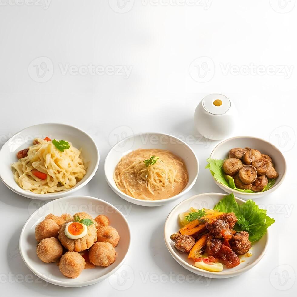 A set of four plates with different types of food photo