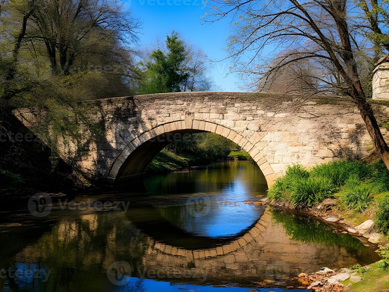 A stone bridge over a river photo