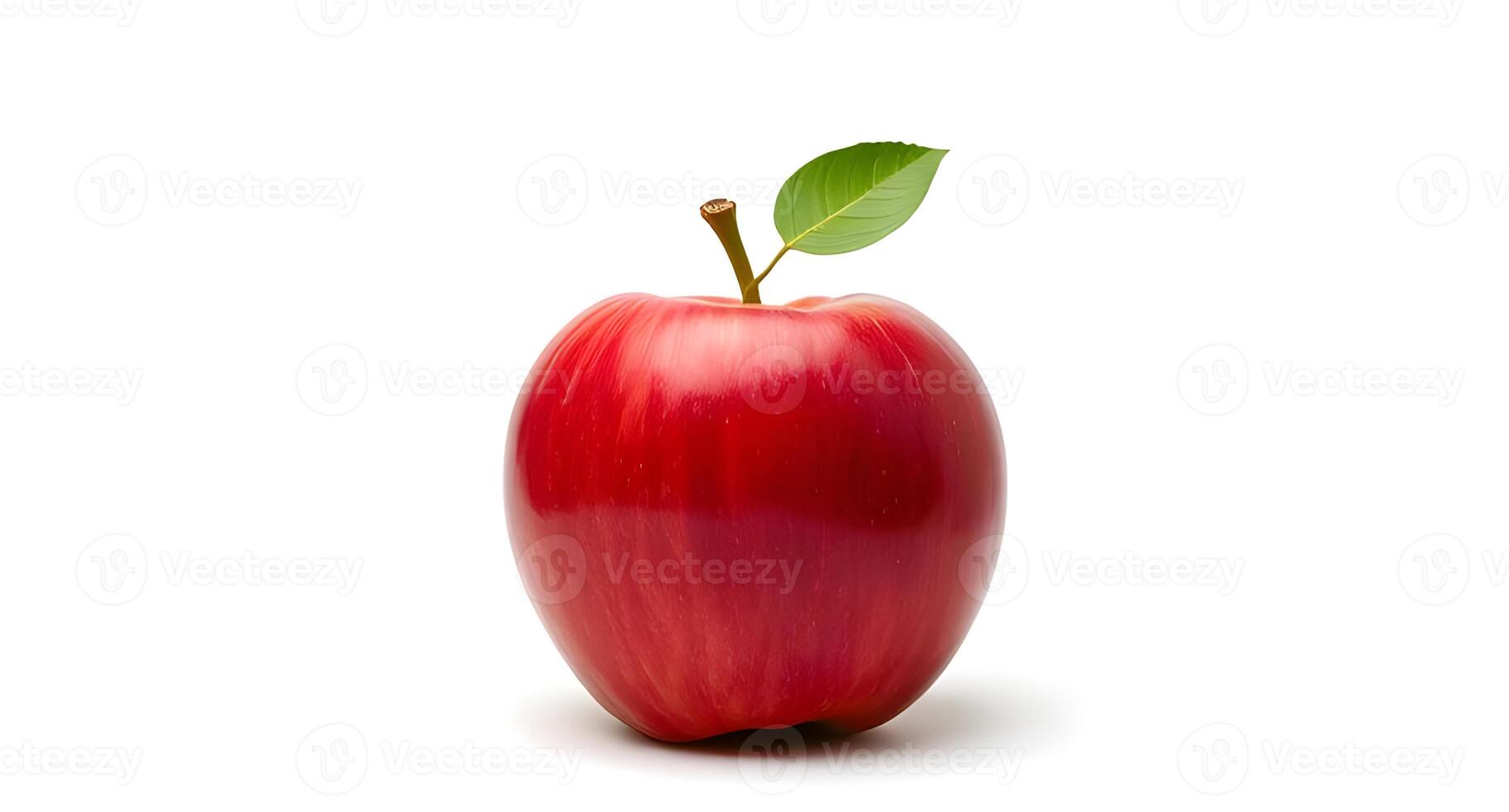 A red apple with a leaf on it photo