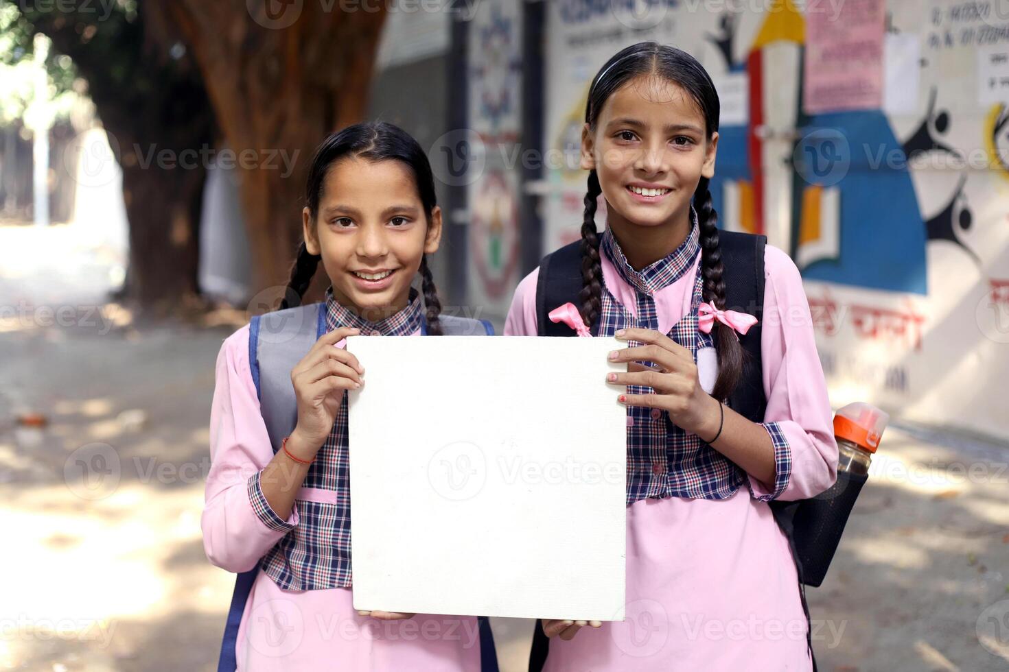 Close-Up View Of An Indian Student Smiling And Looking At The Front Camera photo