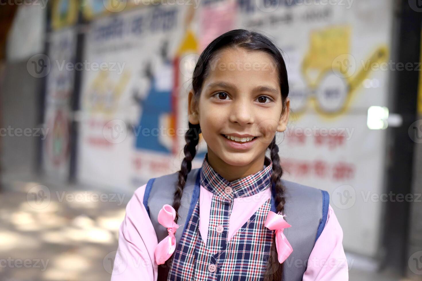 A Secondary Girl Student Making A Pose In Front Of The Camera Arms Crossed photo