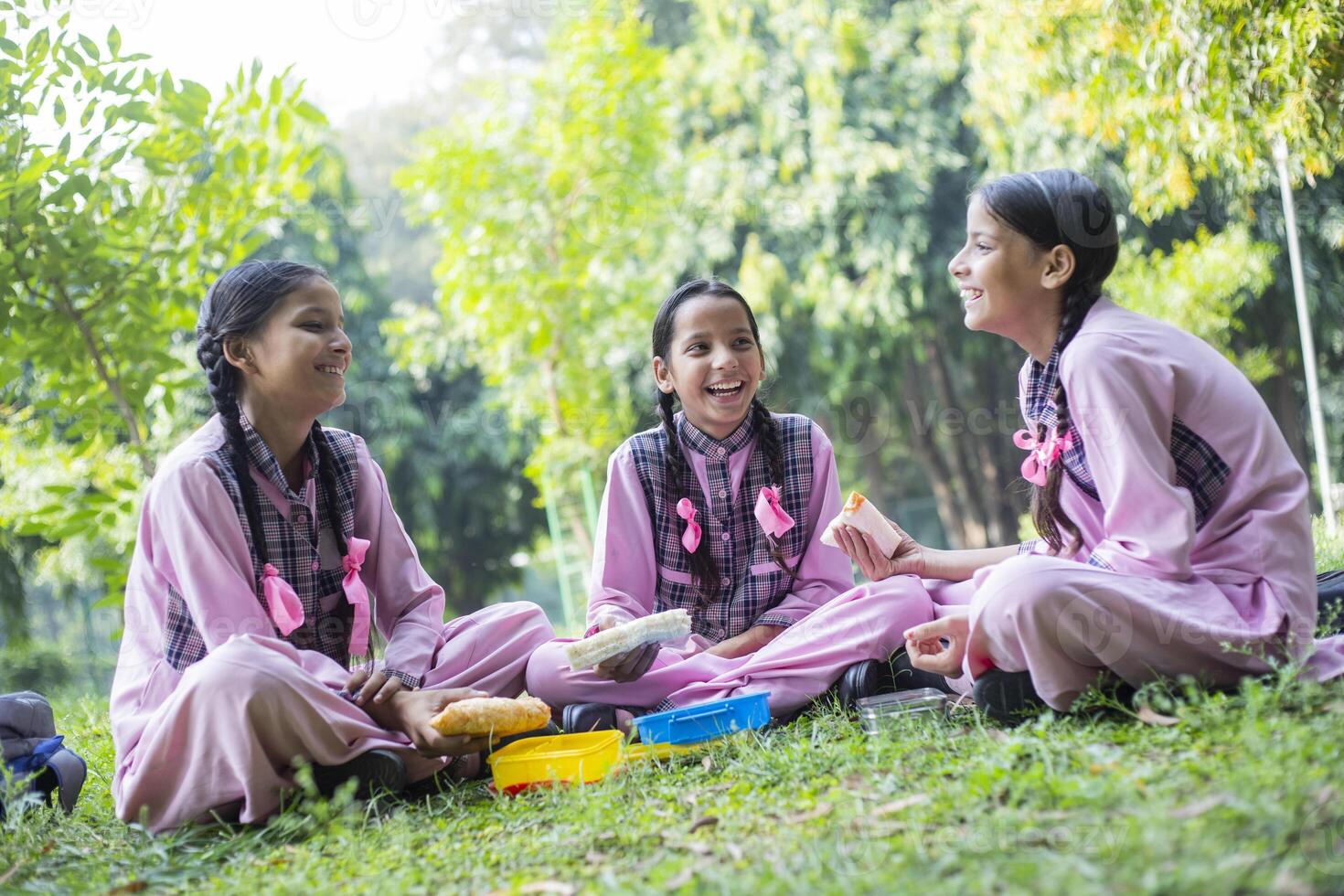 Photoshoot Of Students In Uniform Looking At Camera photo