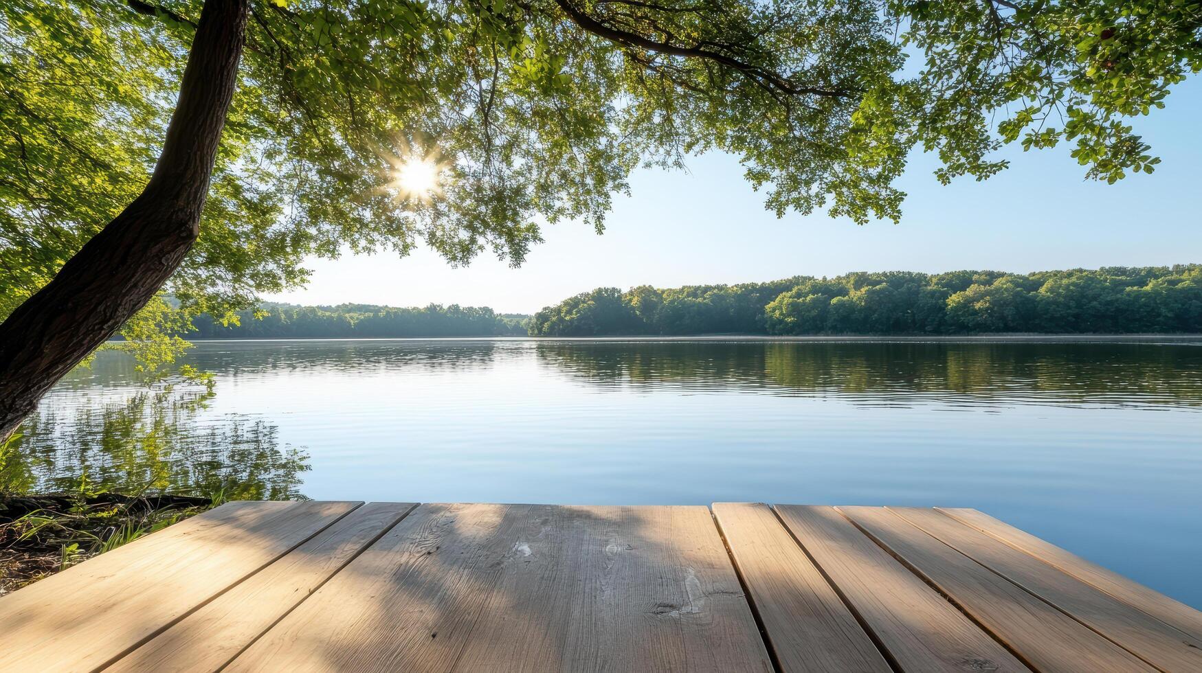 A wooden deck overlooking a lake photo
