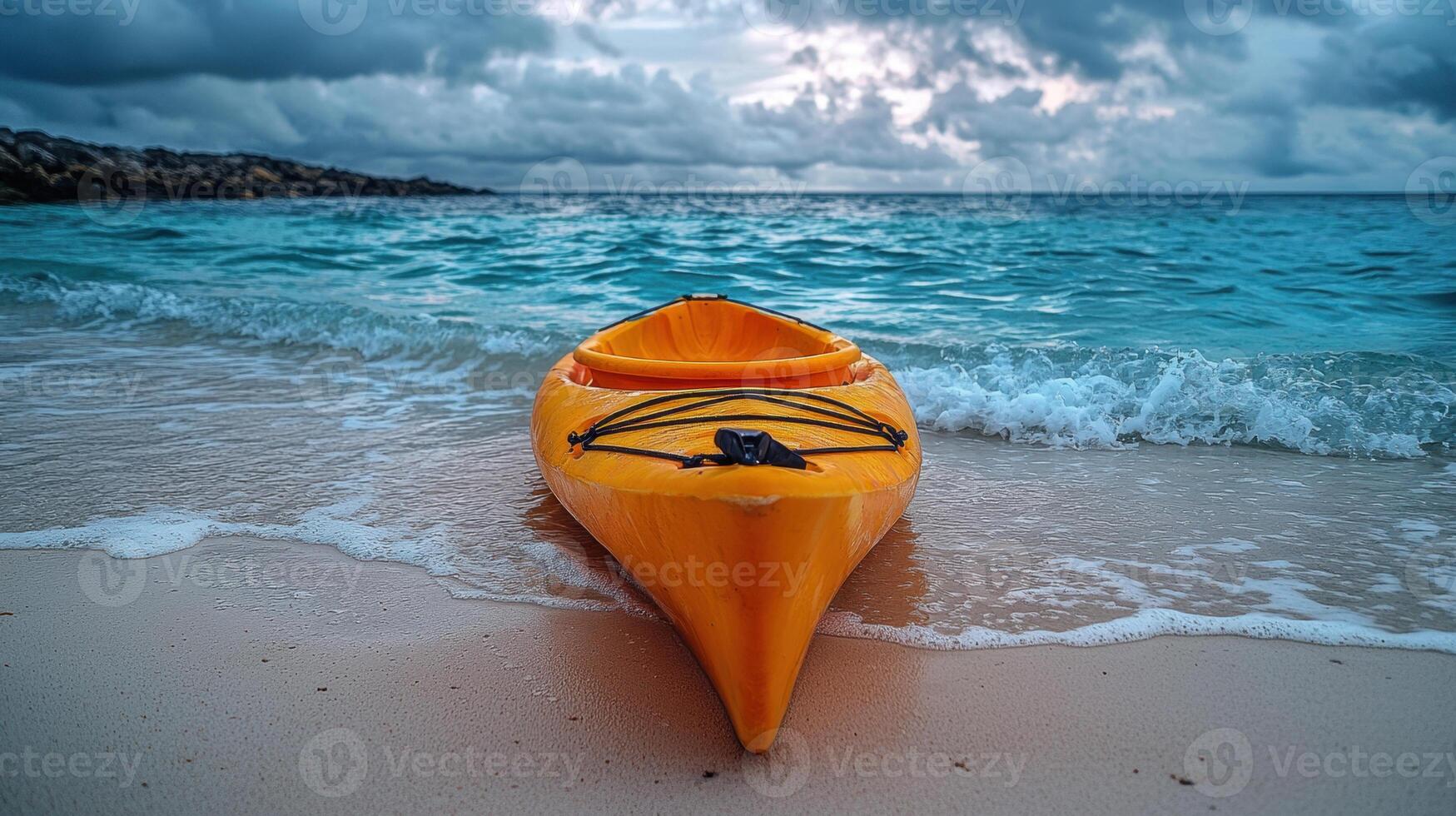 vibrant orange kayak rests on sandy beach as gentle waves lap at its sides, creating serene atmosphere perfect for vacations by beach photo