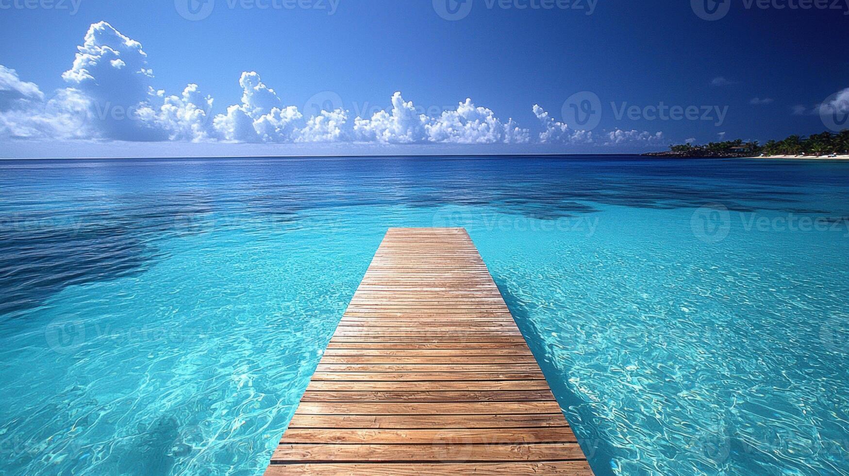 serene beach scene captures essence of vacations with wooden pier extending into crystal clear turquoise waters under bright blue sky. tranquil atmosphere invites relaxation and exploration photo