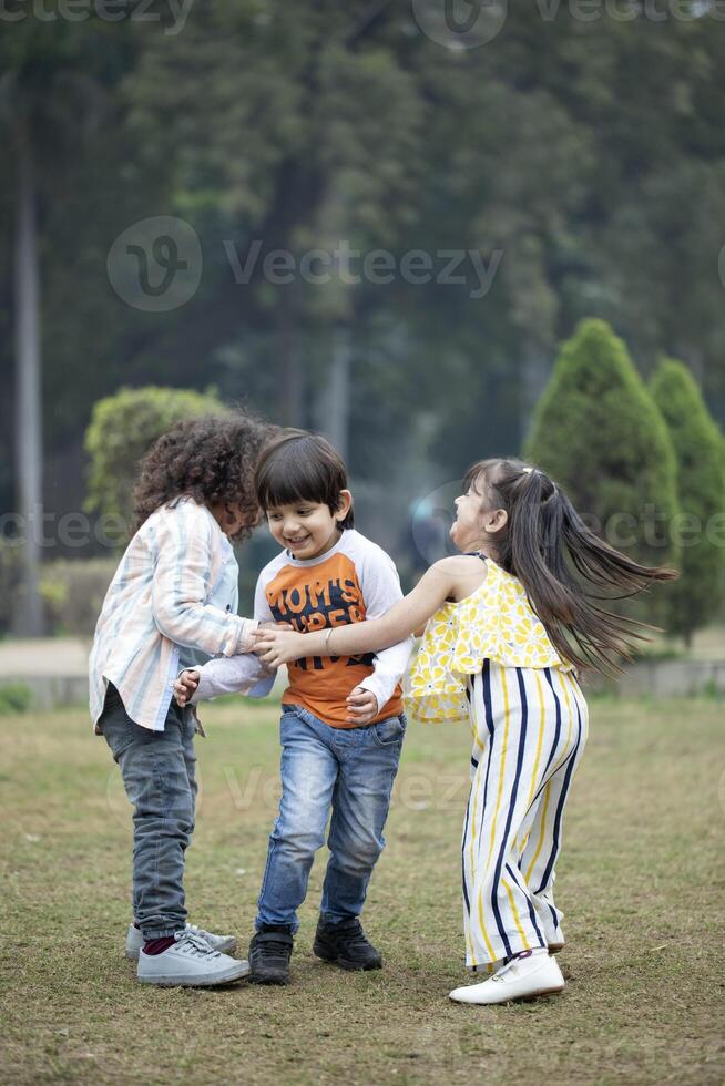 Little Champs Playing The Game Poshampa While On Vacation photo