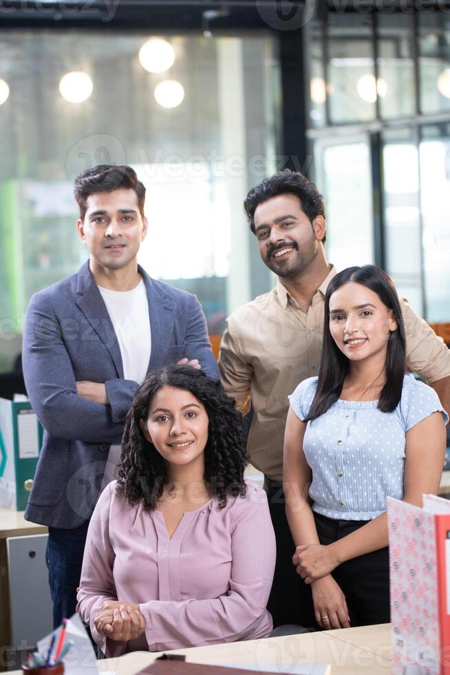 Young Business People On Background Of Modern Office photo