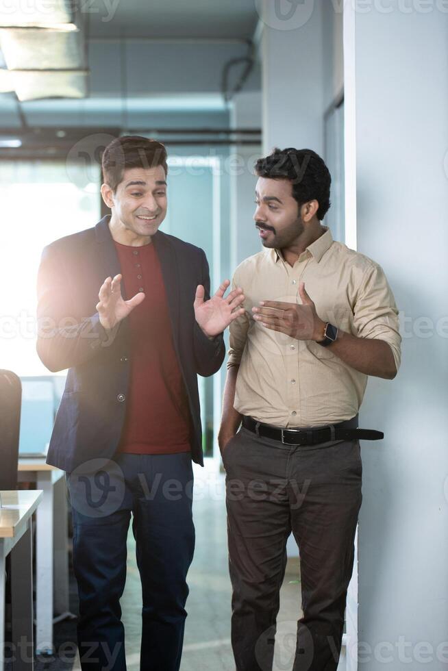 Professional Coworkers Having Talk During Break photo