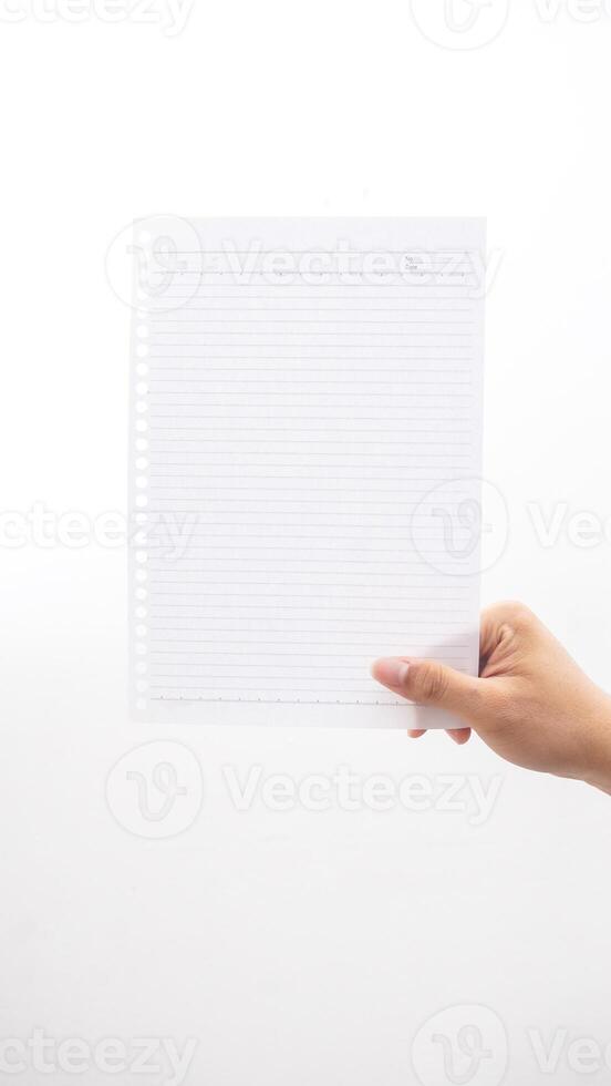 Hand with white stripped paper isolated on white background photo