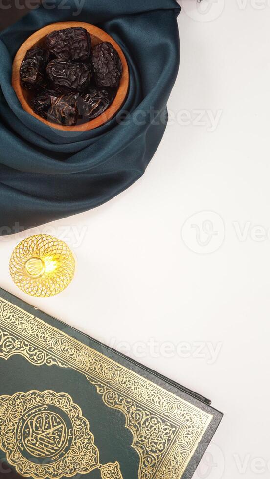 Beautiful muslim decoration for Eid al-Fitr and Ramadan with dark green fabric on light background photo
