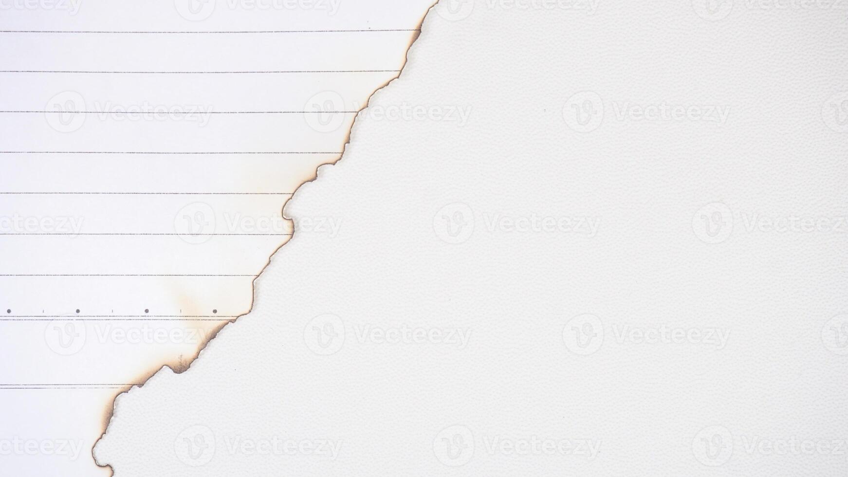 White paper burns edge isolated on a white backgrounds photo