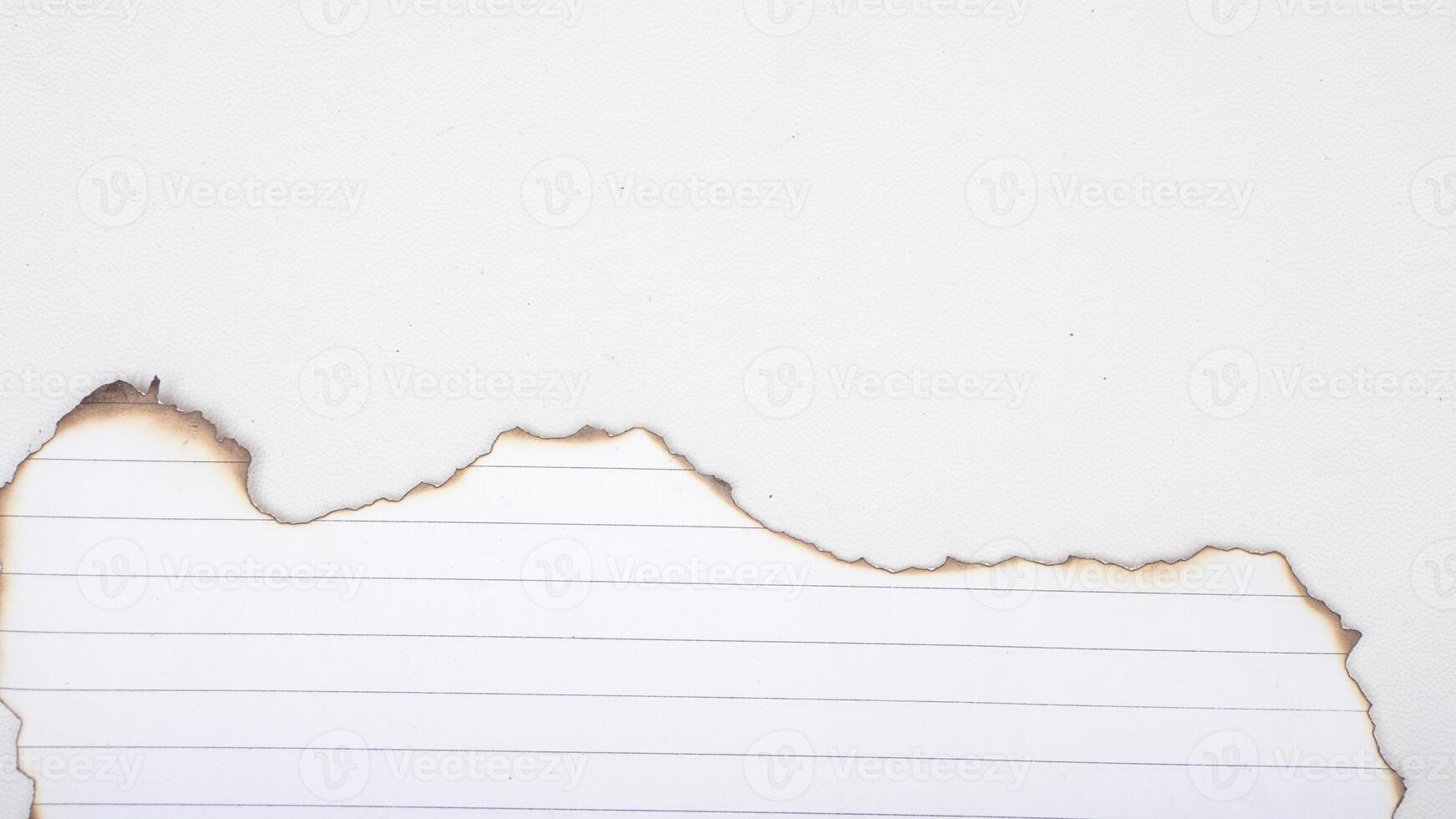 White stripped paper with burnt edges isolated on white background with clipping path photo