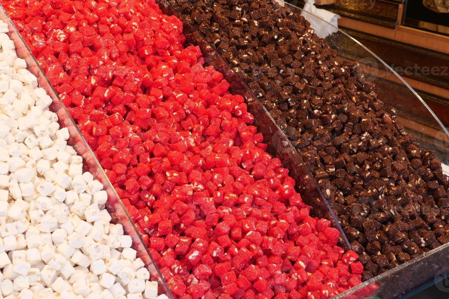 Colorful display of Turkish delight in a market setting photo