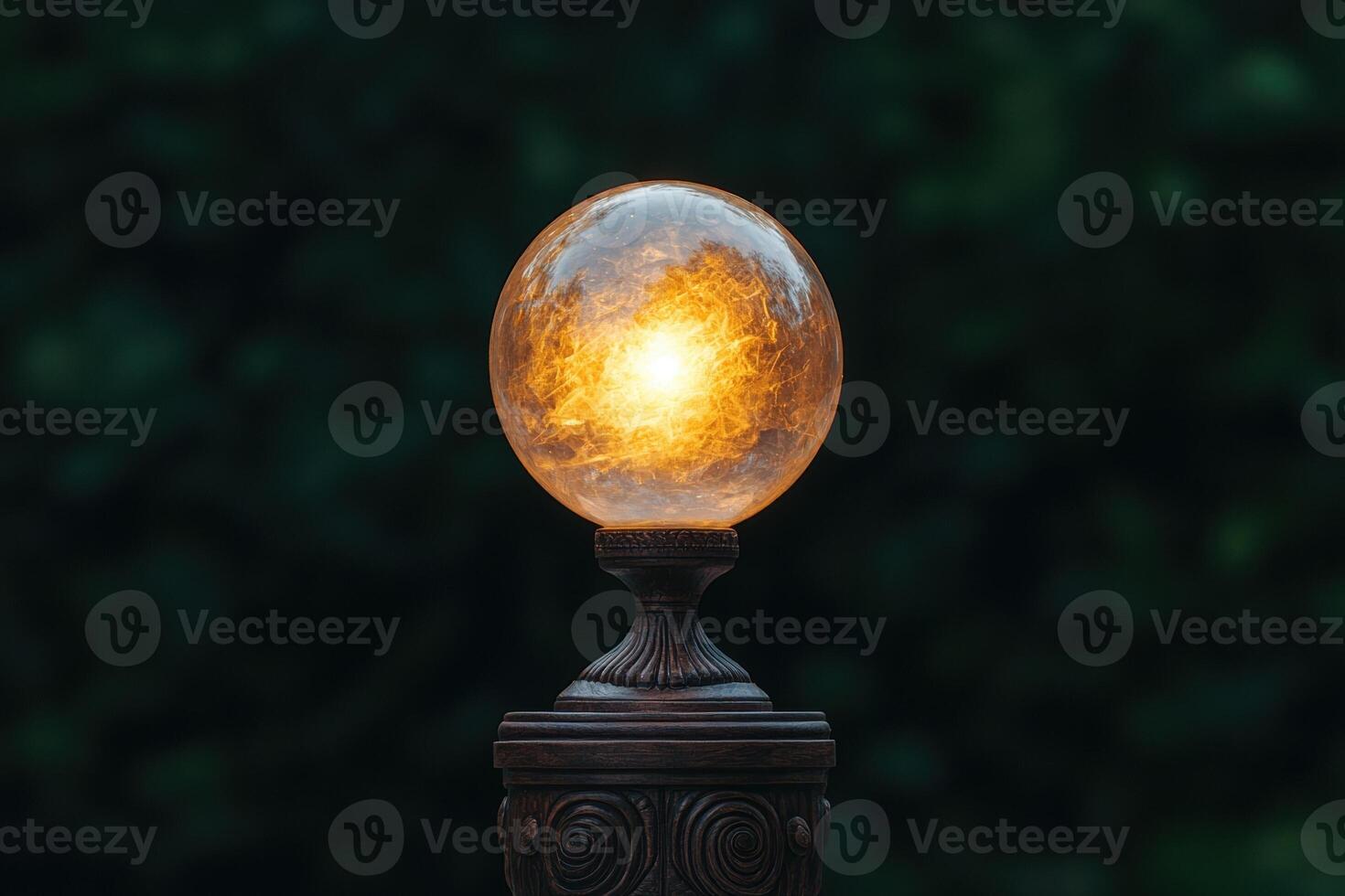Glowing sphere lamp on a pedestal in a garden photo