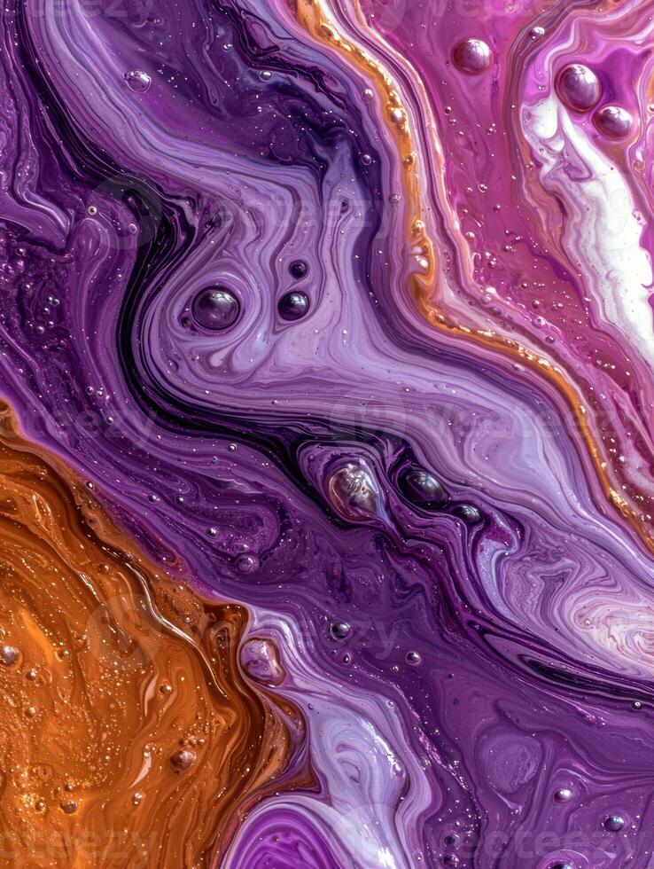 Abstract fluid art with purple, pink, and gold swirls photo