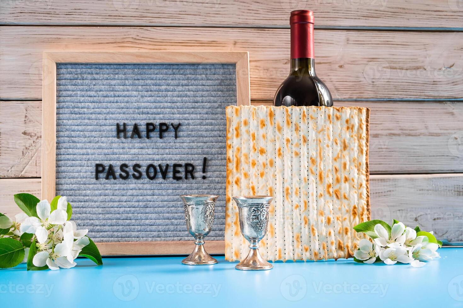 Celebrating spring holiday Passover. Bottle of wine and traditional Jewish matzo photo