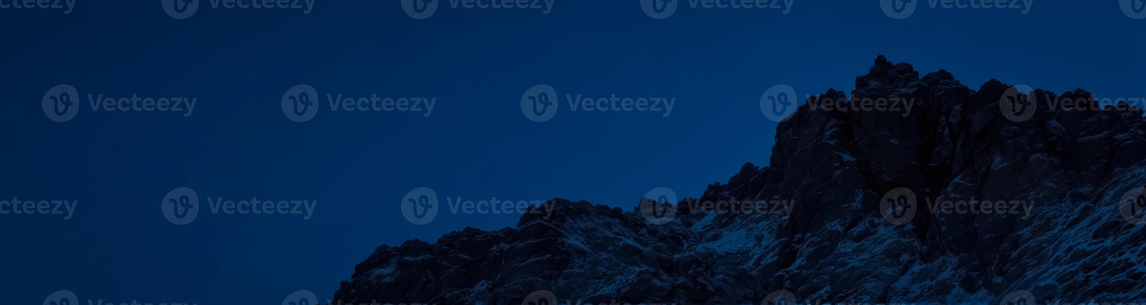 majestic mountain silhouette at twilight photo