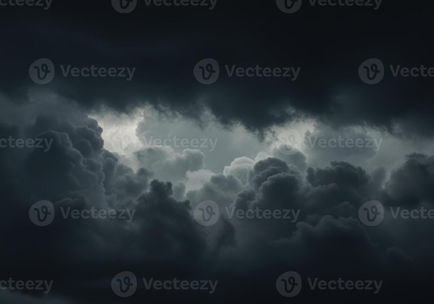 Experience the dramatic beauty of ominous dark storm clouds filling the sky. photo