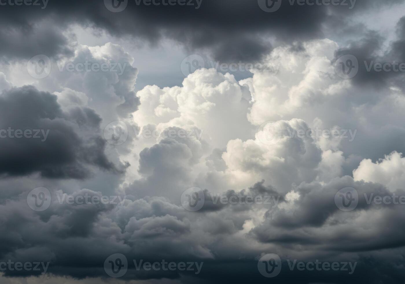 A captivating view of storm clouds with dramatic contrast between light and dark. photo