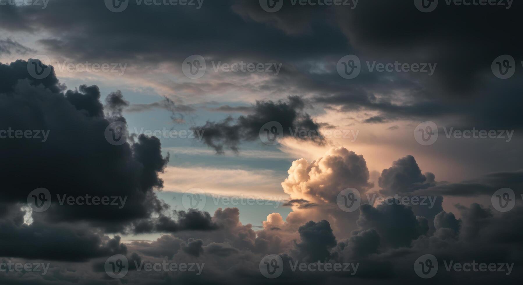 A dramatic skyscape filled with dynamic storm clouds evokes a powerful feeling. photo