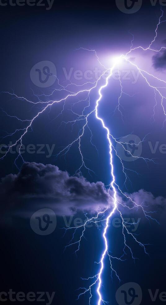 Dramatic electrical storm featuring a large, bright lightning bolt striking down from the clouds. photo