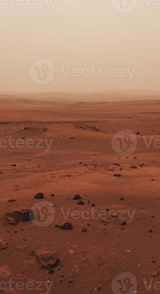A captivating shot of the Martian surface displays a rugged terrain under a hazy atmosphere. photo