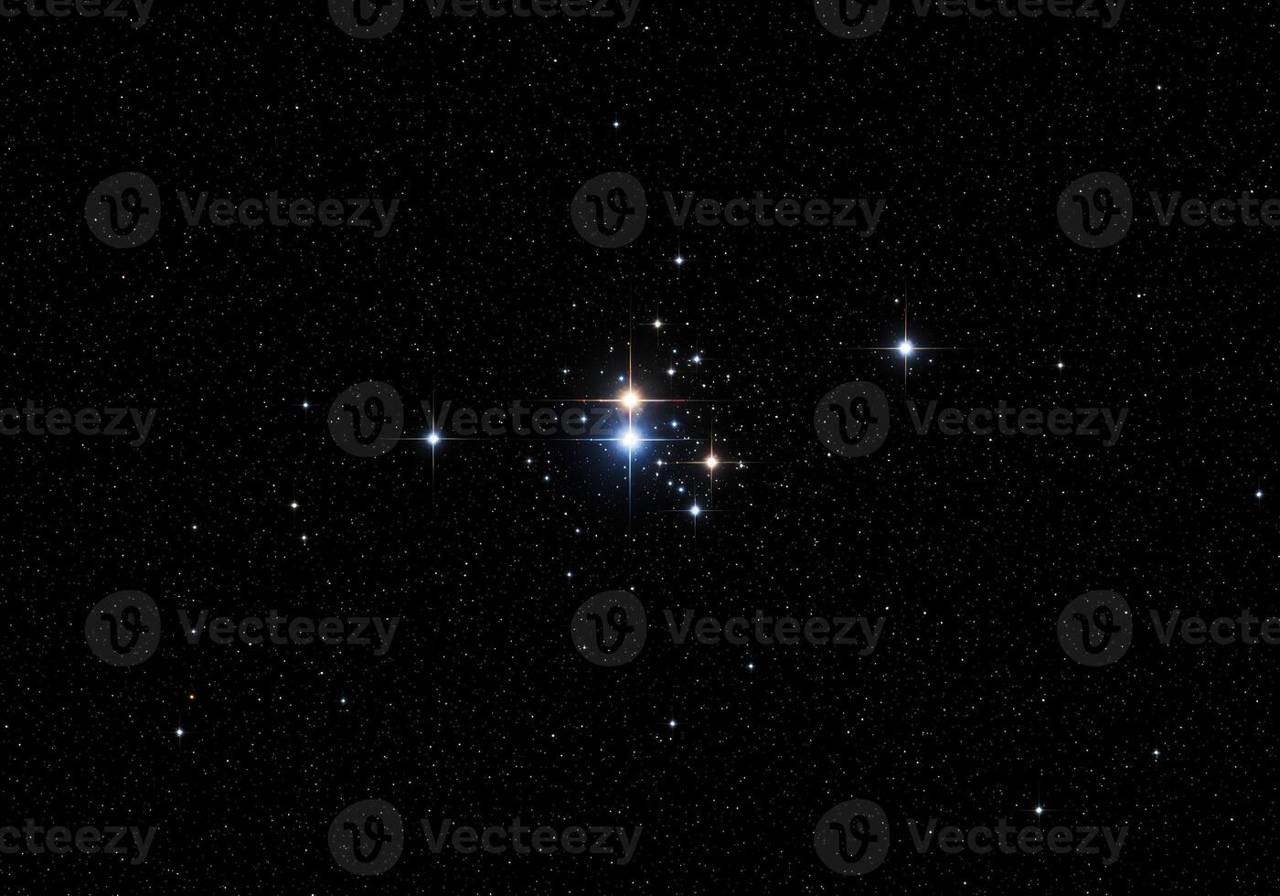 A brilliant celestial star cluster shines brightly in the vast expanse of space. photo